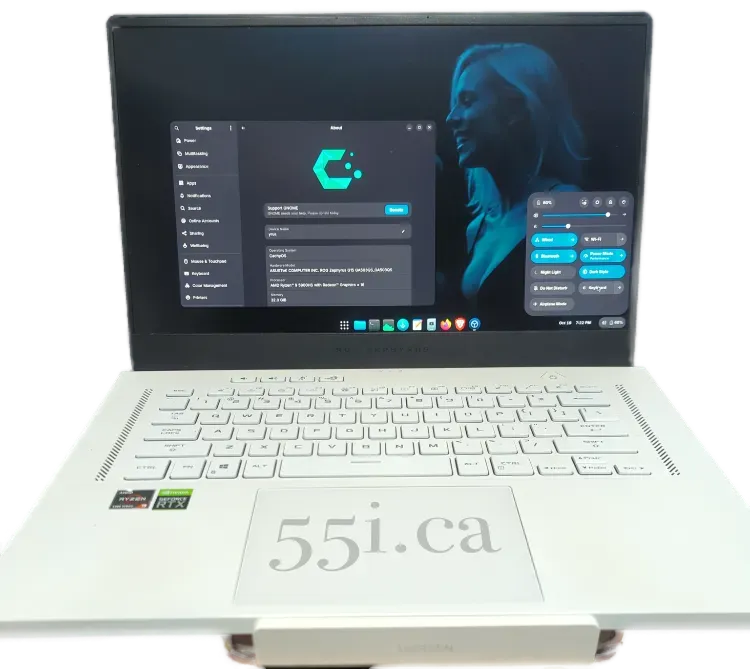 ASUS Zephyrus laptop showcasing Linux desktop environment, highlighting performance benchmarks and sleek design.