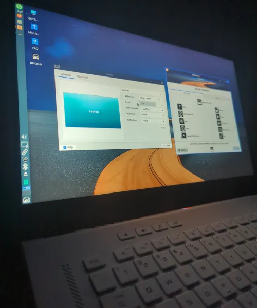 Screenshot showcasing MX Linux AHS live boot on Asus Zephyrus G15 with XFCE desktop, highlighting perfect HiDPI scaling, functional Wi-Fi, and TLP battery support.
